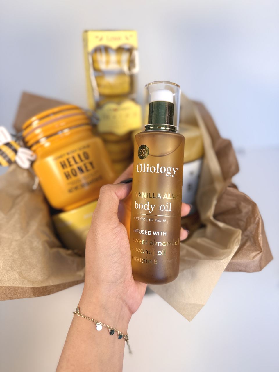 Vanilla almond body oil from a honey-inspired basket