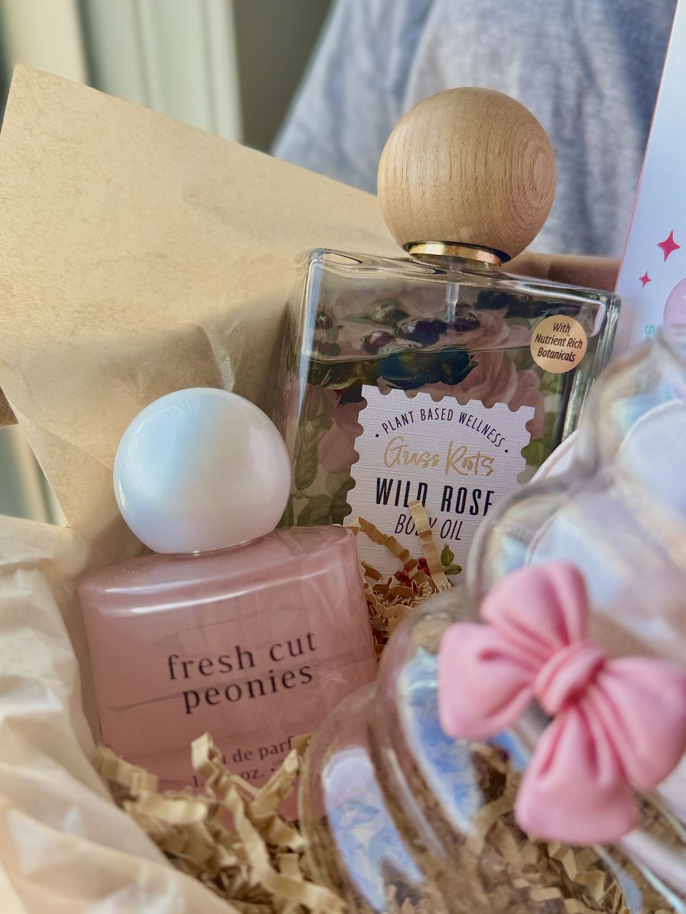 Wild rose body oil and peony fragrance basket details