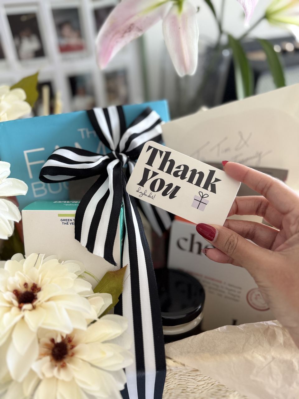 Thank-you card and black ribbon gift basket details